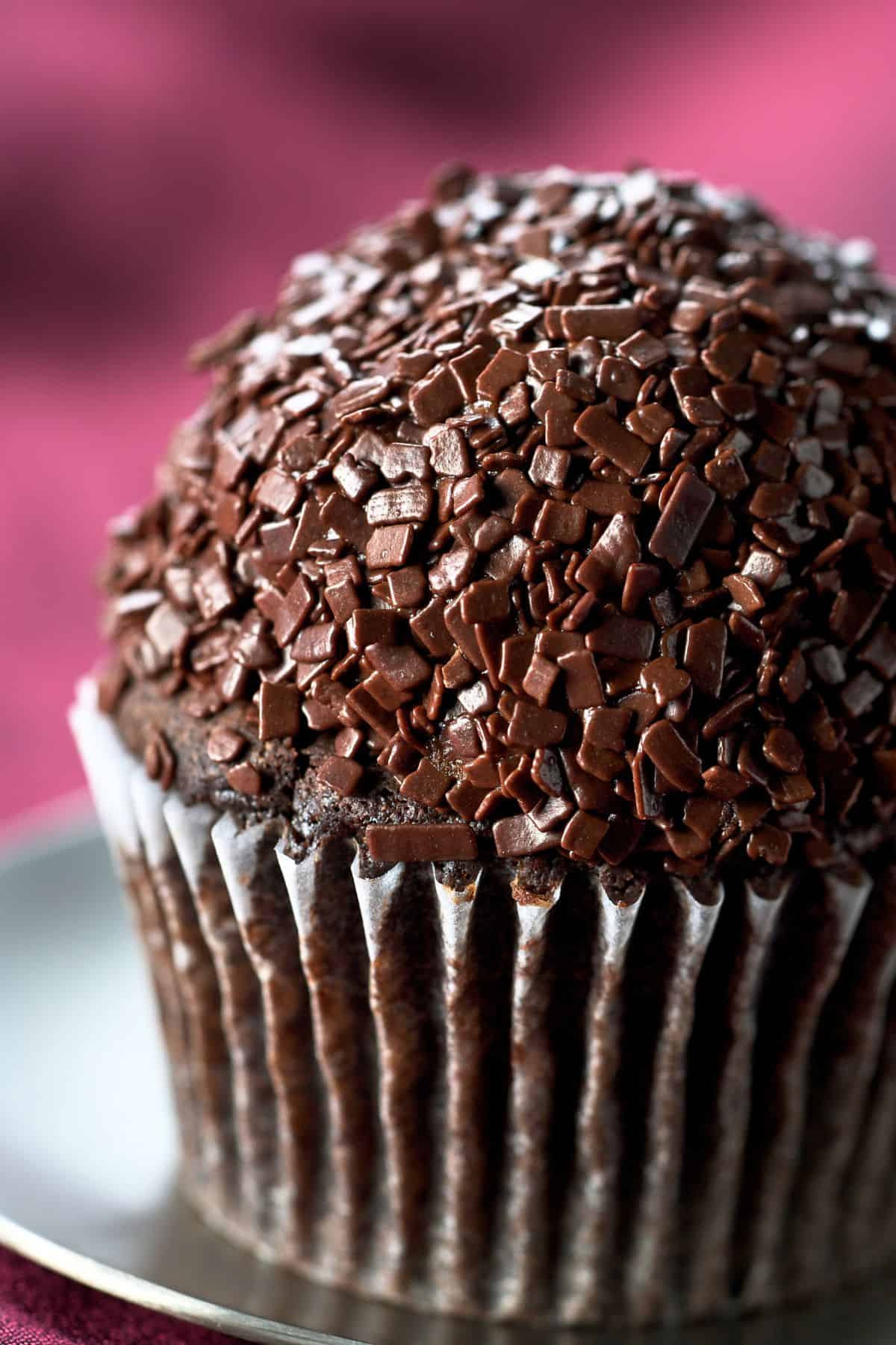 Close up of one brigadeiro cupcake in a platter. 