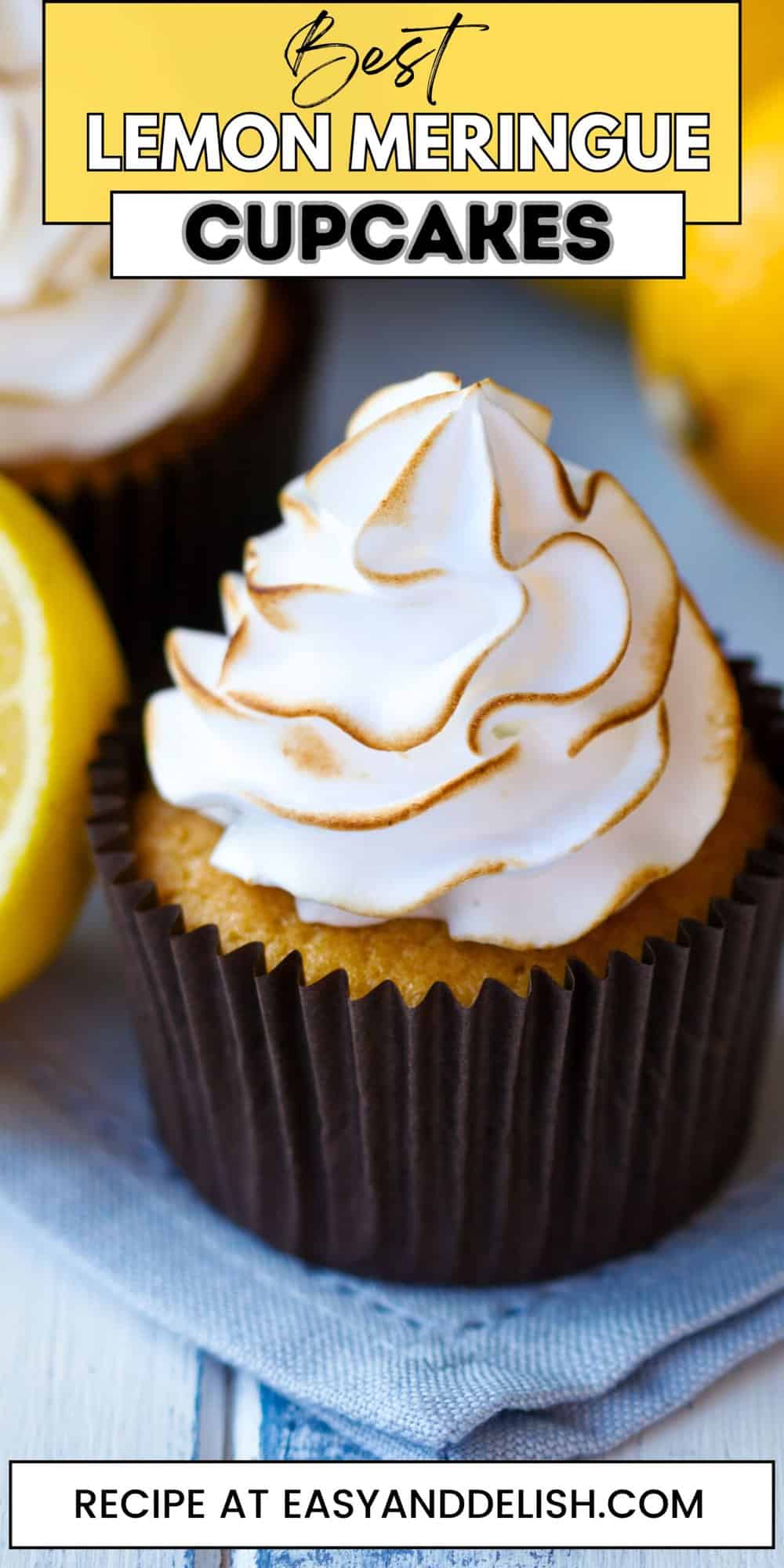 Several lemon meringue cupcakes on a surface.