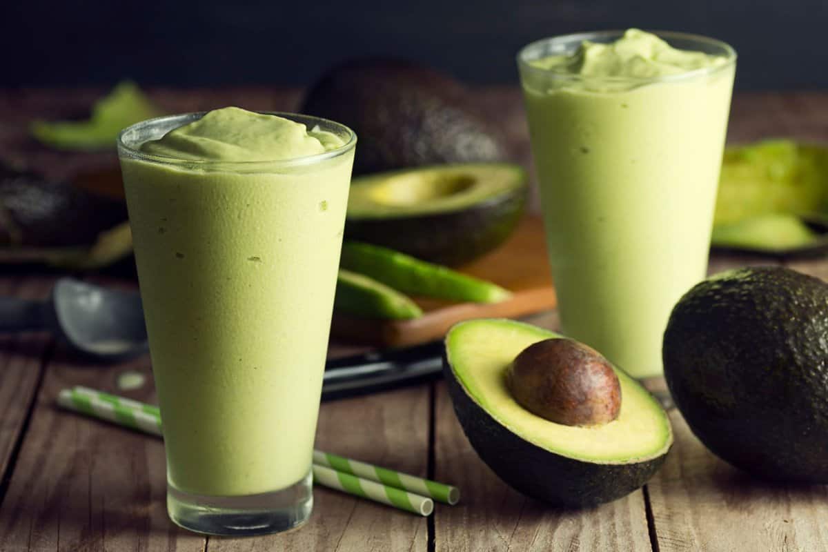 Two glasses of a weight loss avocado smoothie for breakfast or snack. 