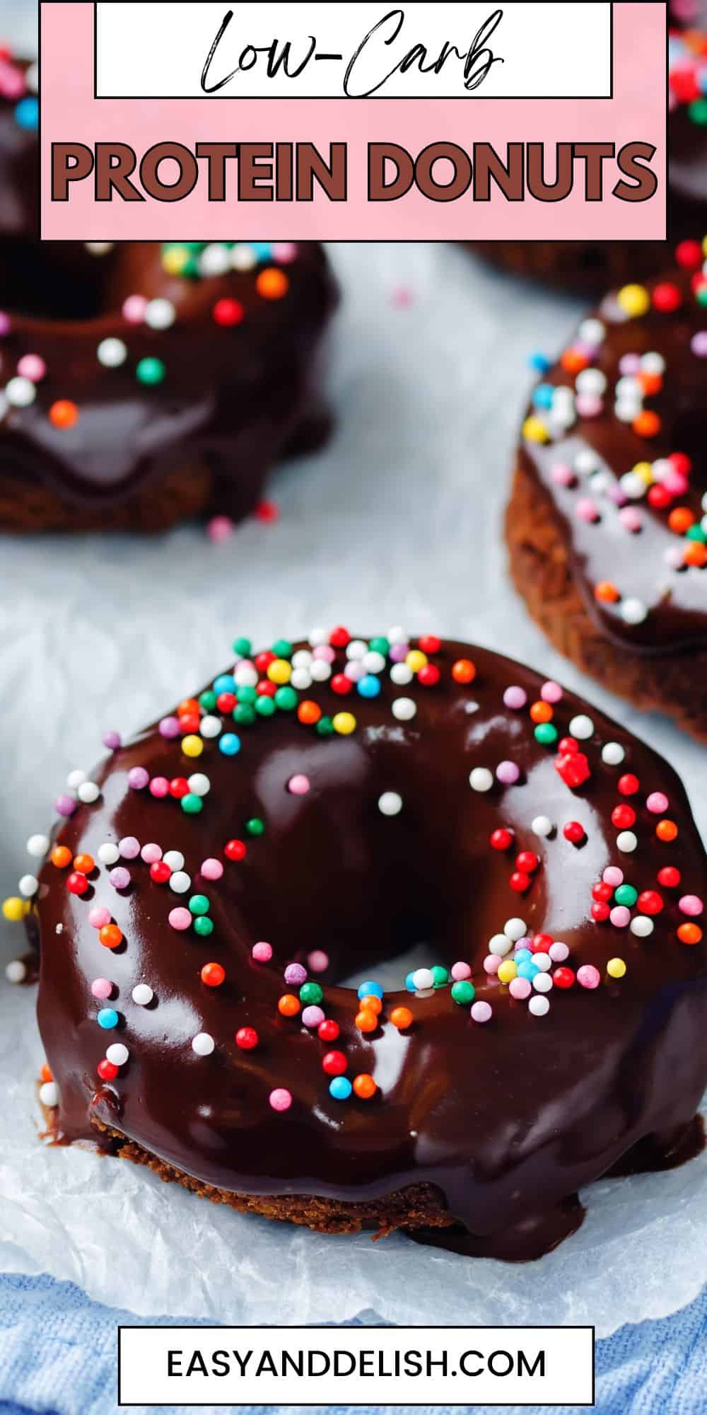 Pin showing several low-carb protein donuts on a  parchment paper. 