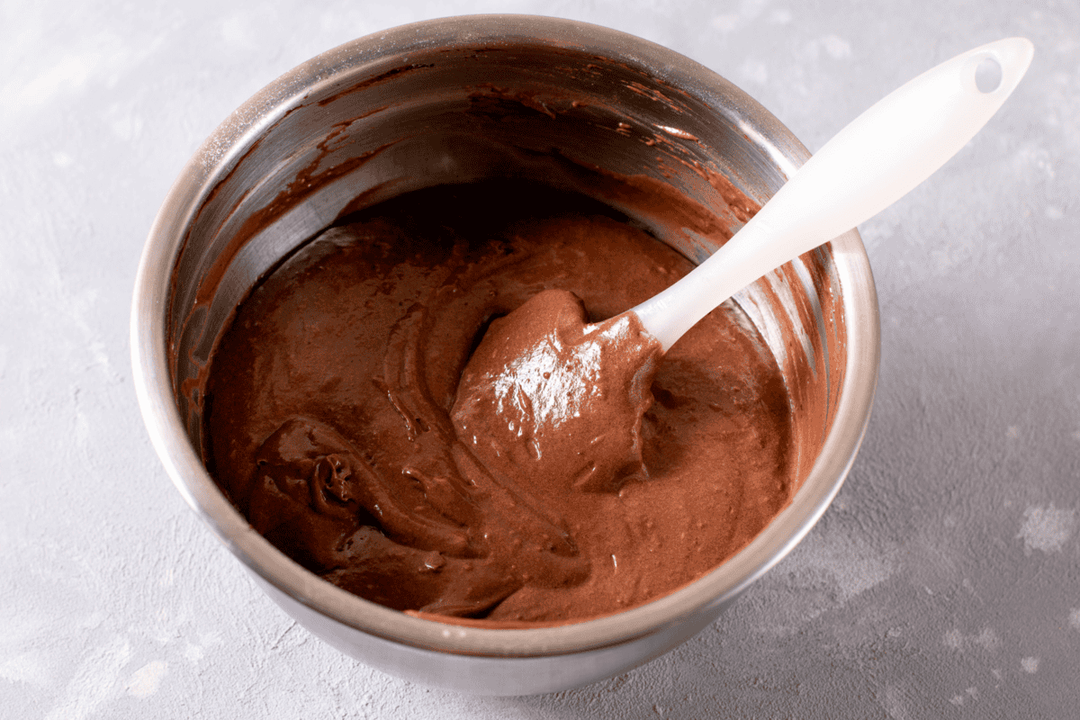 Chocolate batter mixed in a bowl.