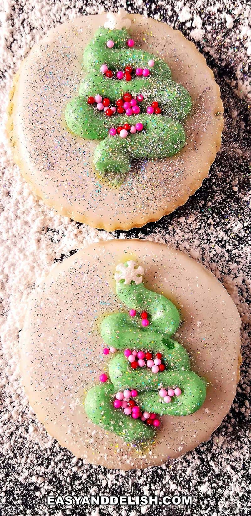 close up of two Christmas ccookies on a surface