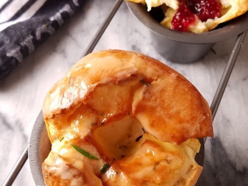 https://www.easyanddelish.com/wp-content/uploads/2021/12/popovers-or-yorkshire-pudding-whole-and-open-500x375.jpg